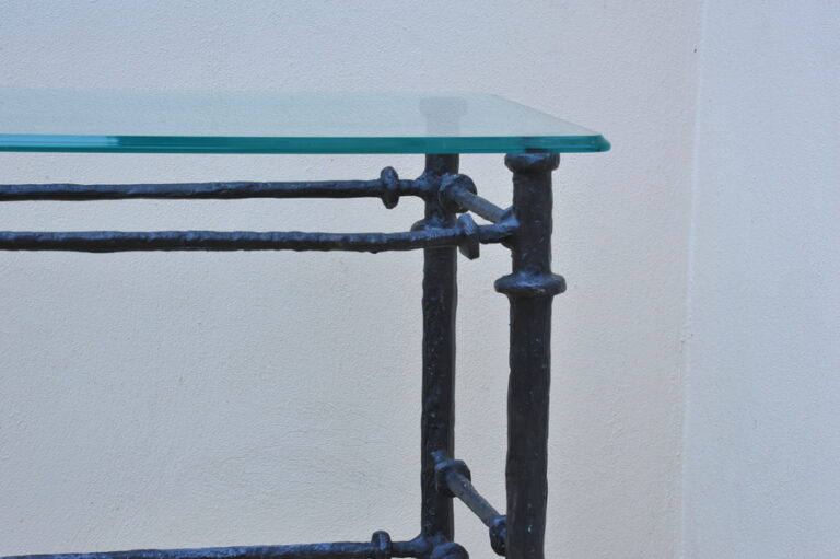 cast metal and glass giacommetti inspired console