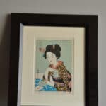 a pair of vintage japanese wood block prints