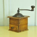 a vintage french coffee grinder