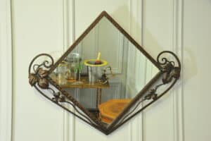 striking vintage wrought iron wall mirror