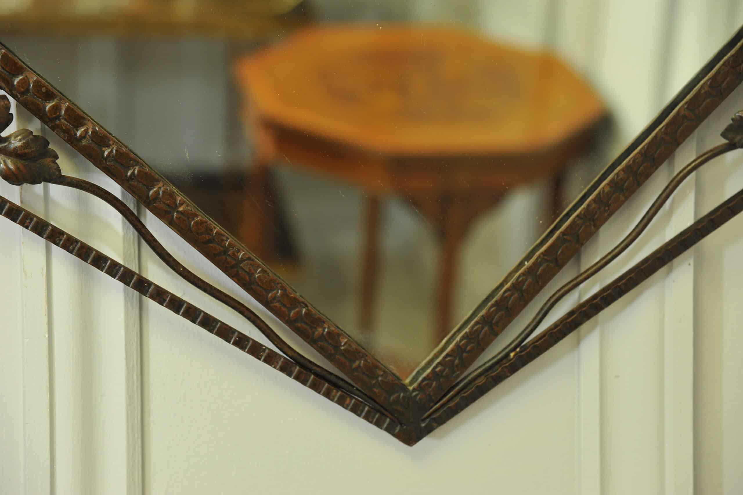 striking vintage wrought iron wall mirror
