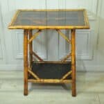 antique english two tier bamboo lacquered side table