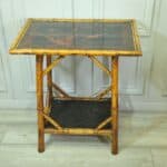 antique english two tier bamboo lacquered side table