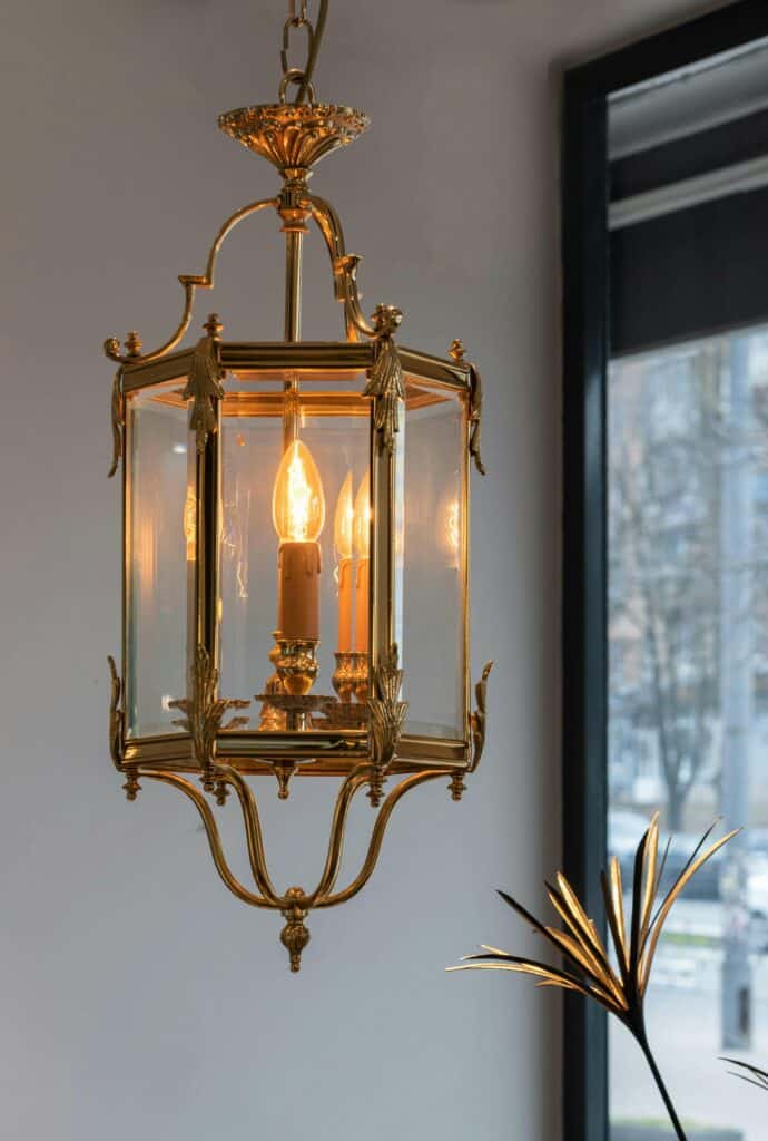 An image of antique lighting hanging in a living room.